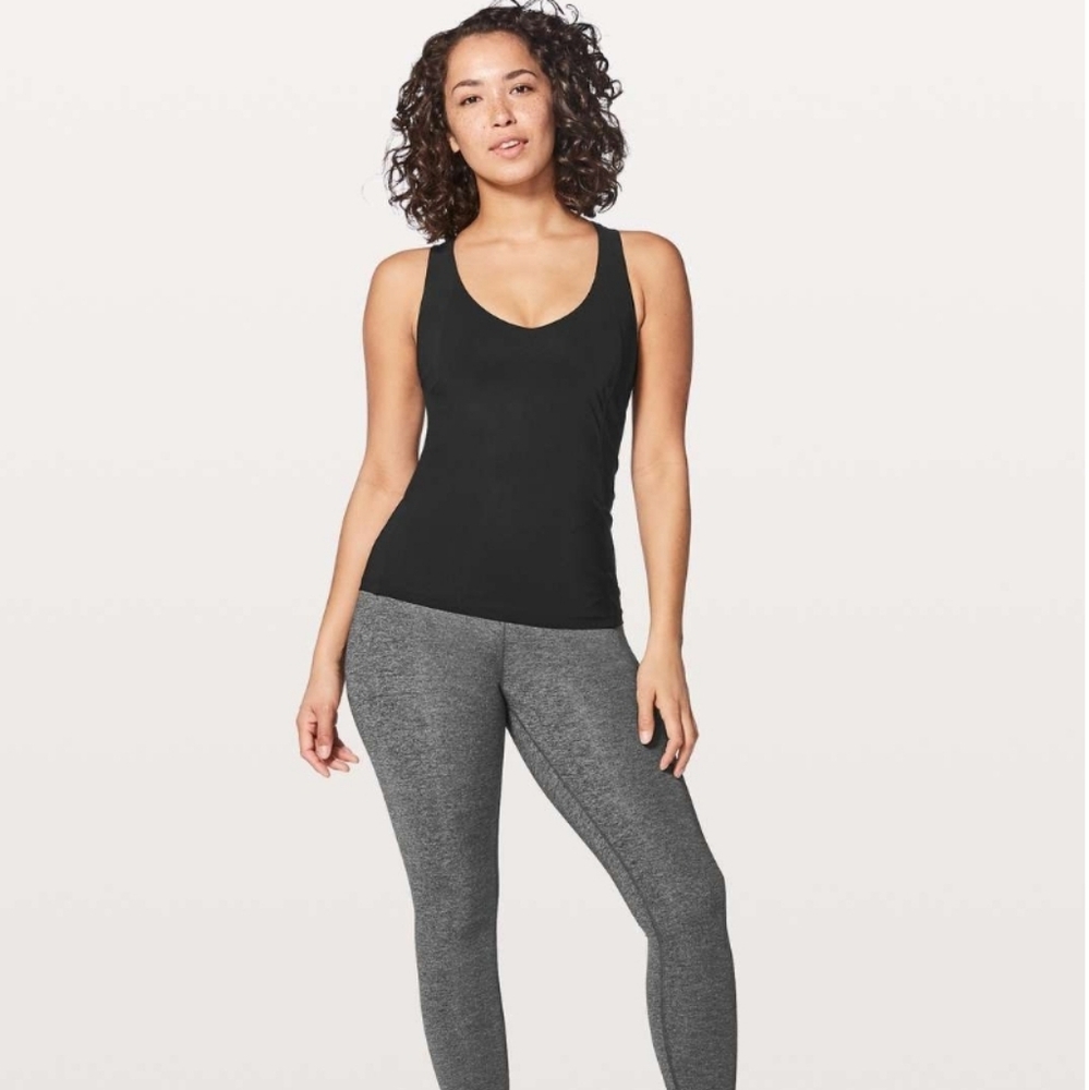 Lululemon long breathe 2 in 1, black tank top, sz 4, with pads.